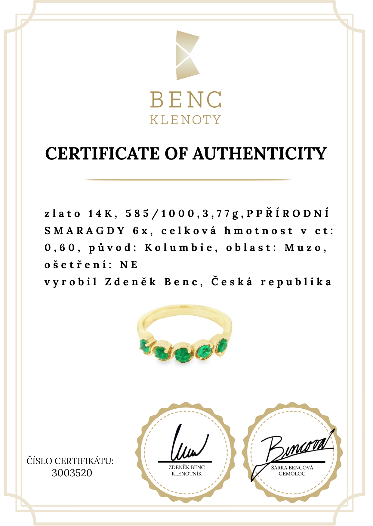 Elegant gold ring with emeralds