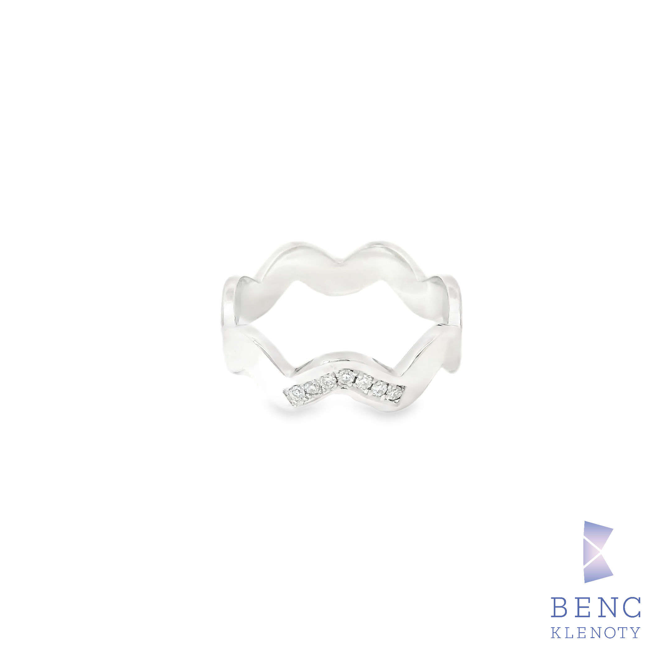 Vlnitý zlatý prsten s diamanty